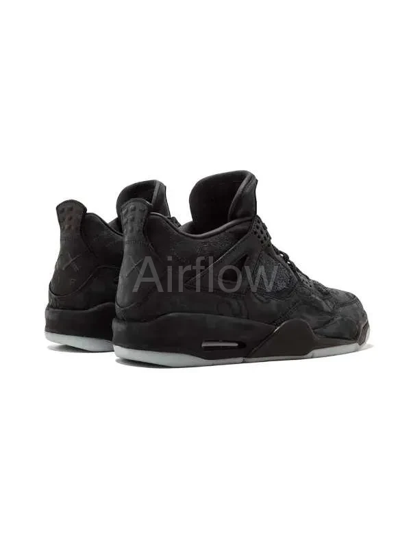Jordan retro 4 x Kaws negras 3